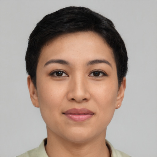 Joyful asian young-adult female with short  black hair and brown eyes