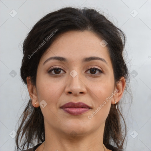 Joyful latino young-adult female with medium  brown hair and brown eyes