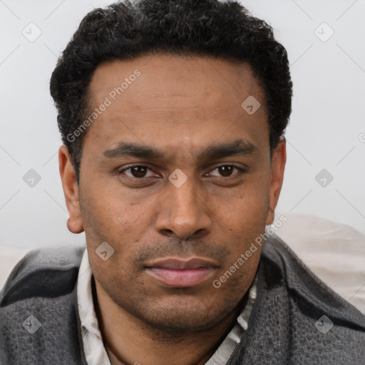 Neutral latino young-adult male with short  brown hair and brown eyes