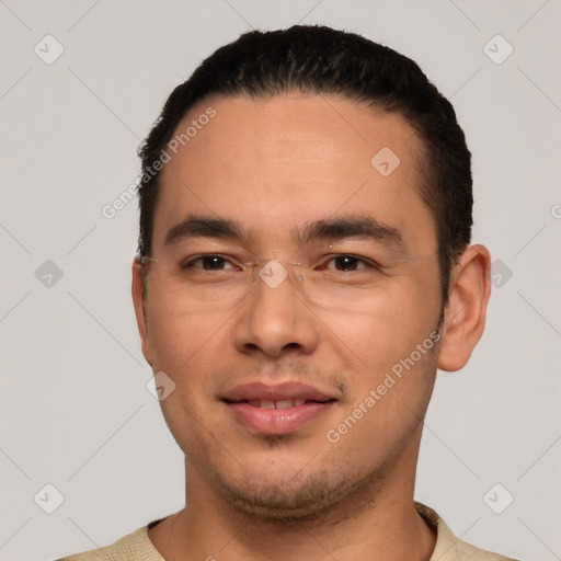 Joyful white young-adult male with short  black hair and brown eyes