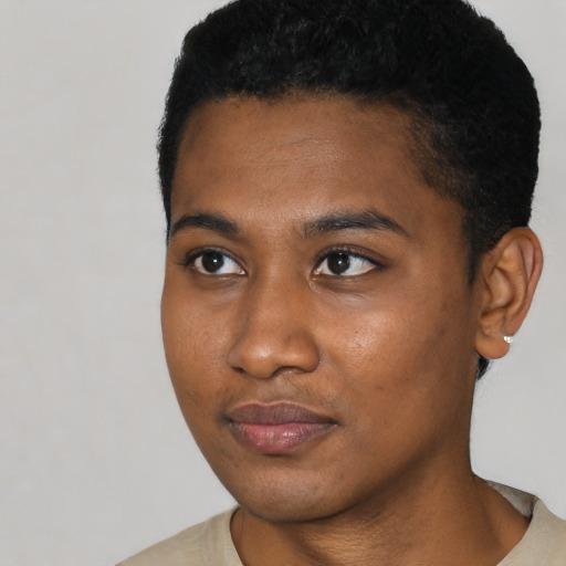 Neutral black young-adult male with short  black hair and brown eyes