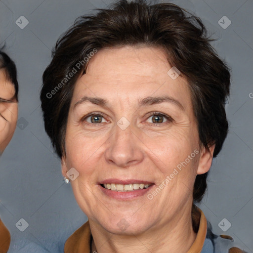 Joyful white adult female with short  brown hair and brown eyes