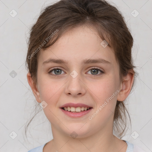 Joyful white child female with medium  brown hair and grey eyes