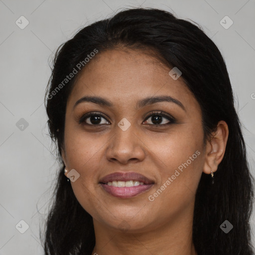 Joyful latino young-adult female with long  brown hair and brown eyes