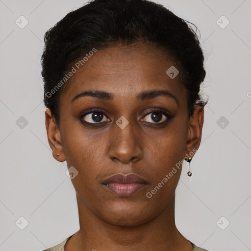 Neutral black young-adult female with short  brown hair and brown eyes