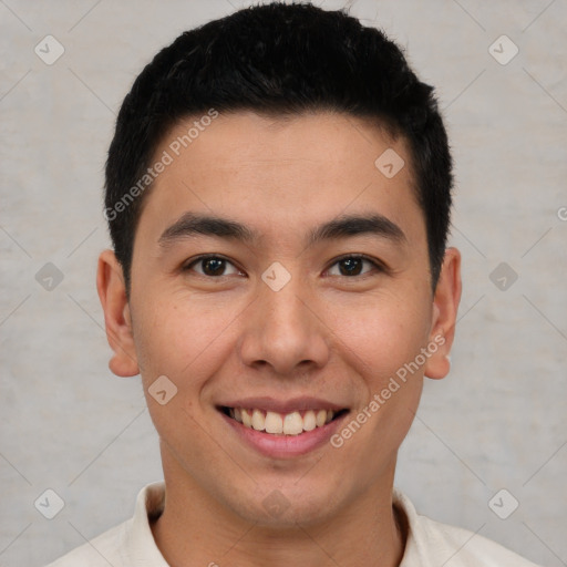 Joyful latino young-adult male with short  brown hair and brown eyes