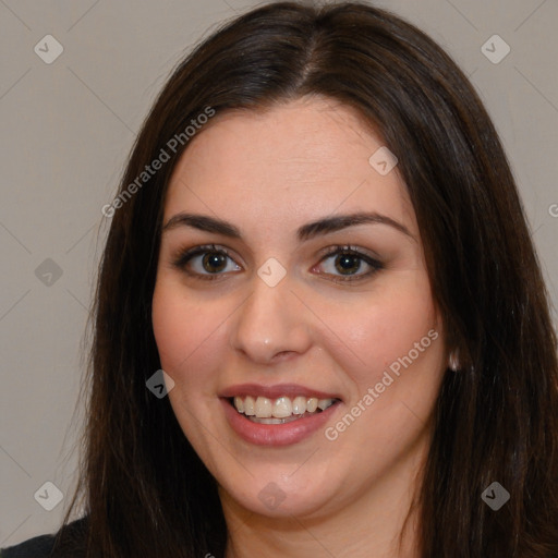 Joyful white young-adult female with long  brown hair and brown eyes