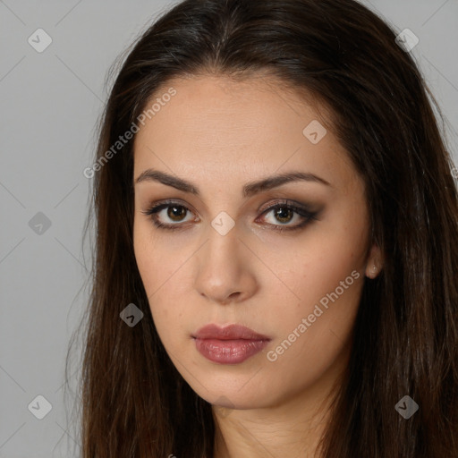 Neutral white young-adult female with long  brown hair and brown eyes