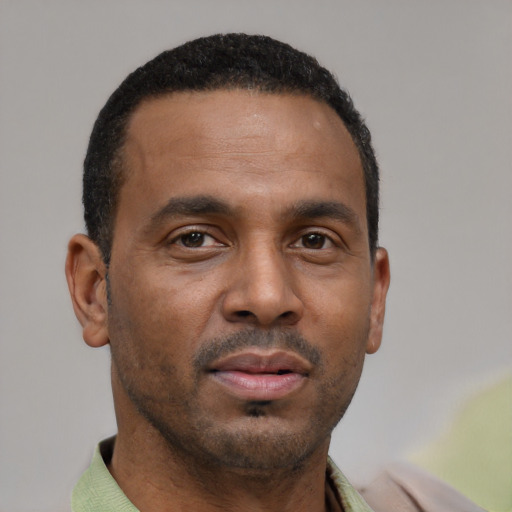 Neutral latino young-adult male with short  brown hair and brown eyes