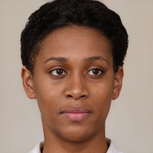 Neutral black young-adult female with short  brown hair and brown eyes