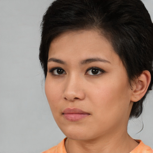 Neutral asian young-adult female with short  brown hair and brown eyes