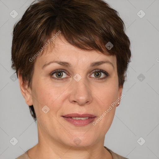 Joyful white adult female with short  brown hair and grey eyes