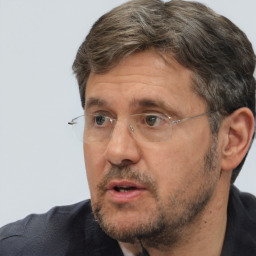 Neutral white adult male with short  brown hair and brown eyes