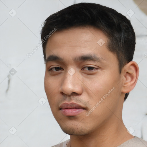 Neutral asian young-adult male with short  black hair and brown eyes