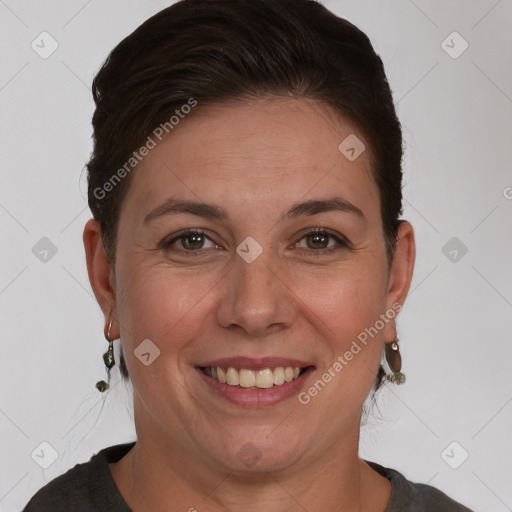 Joyful white adult female with short  brown hair and brown eyes