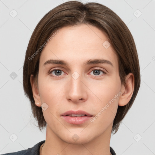 Neutral white young-adult female with medium  brown hair and brown eyes