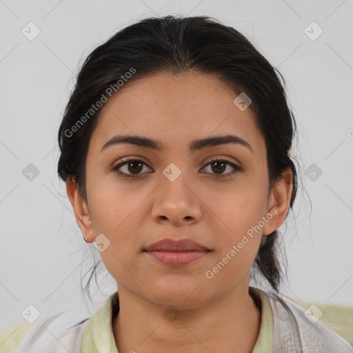 Joyful latino young-adult female with medium  brown hair and brown eyes