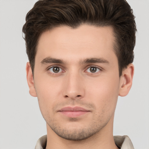 Neutral white young-adult male with short  brown hair and brown eyes