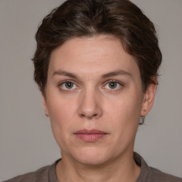 Neutral white young-adult female with short  brown hair and grey eyes