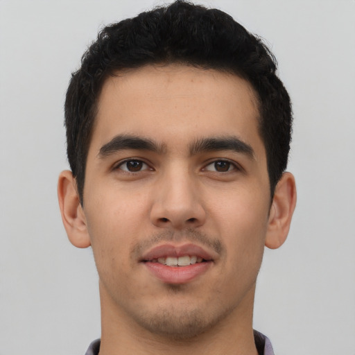 Neutral latino young-adult male with short  brown hair and brown eyes