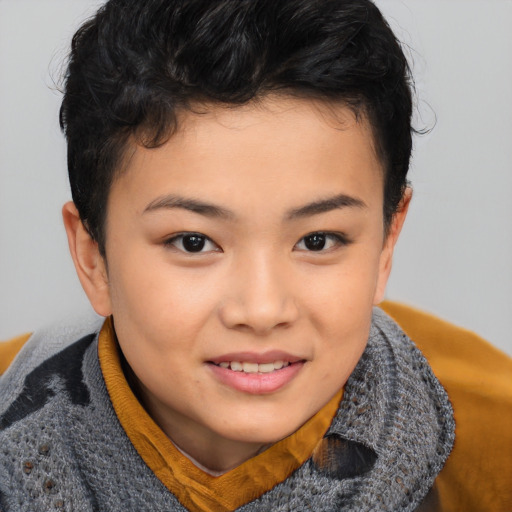 Joyful asian child female with short  brown hair and brown eyes