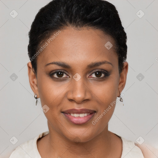 Joyful black young-adult female with short  brown hair and brown eyes
