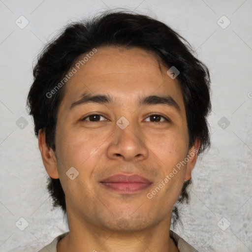 Joyful asian adult male with short  brown hair and brown eyes