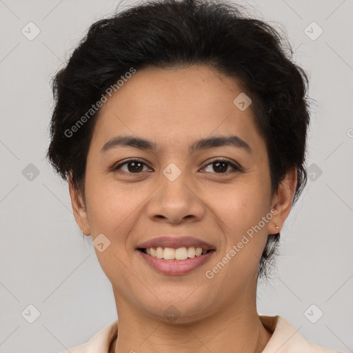 Joyful latino young-adult female with short  brown hair and brown eyes