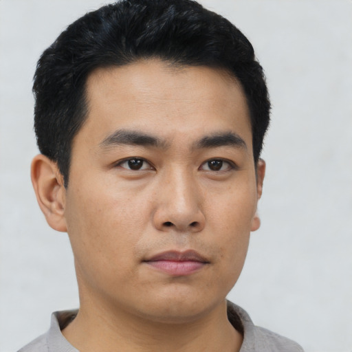 Neutral asian young-adult male with short  black hair and brown eyes