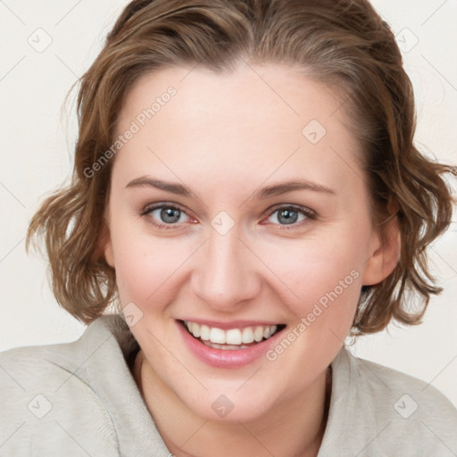 Joyful white young-adult female with medium  brown hair and blue eyes