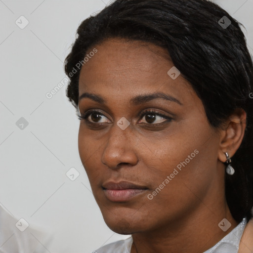 Neutral black young-adult female with short  black hair and brown eyes