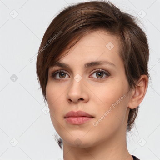 Neutral white young-adult female with medium  brown hair and brown eyes