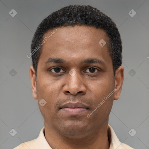 Neutral latino young-adult male with short  brown hair and brown eyes