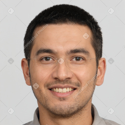 Joyful white young-adult male with short  black hair and brown eyes