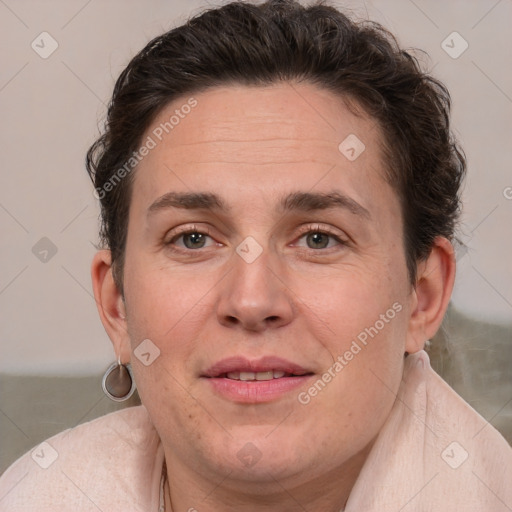 Joyful white adult female with short  brown hair and brown eyes