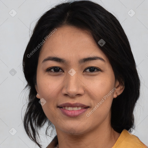 Joyful asian young-adult female with medium  black hair and brown eyes