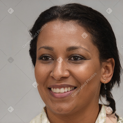 Joyful black young-adult female with medium  brown hair and brown eyes