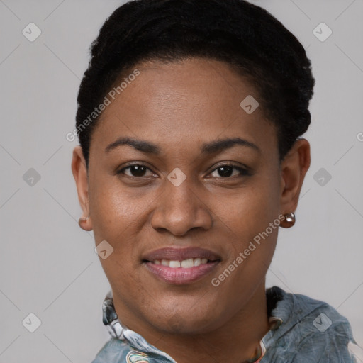 Joyful black young-adult female with short  black hair and brown eyes