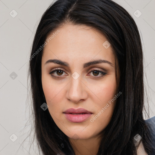 Neutral white young-adult female with long  brown hair and brown eyes