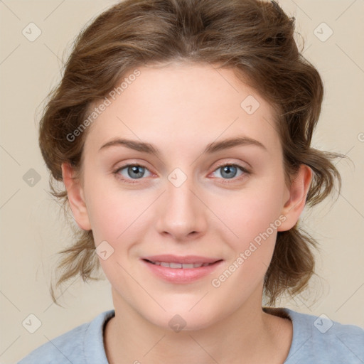 Joyful white young-adult female with medium  brown hair and blue eyes