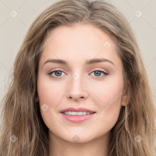 Joyful white young-adult female with long  brown hair and grey eyes