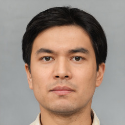 Neutral asian young-adult male with short  brown hair and brown eyes