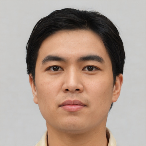 Neutral asian young-adult male with short  black hair and brown eyes