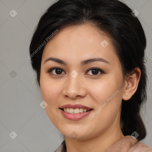 Joyful asian young-adult female with medium  brown hair and brown eyes