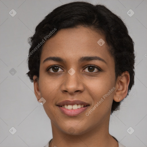 Joyful latino young-adult female with short  brown hair and brown eyes