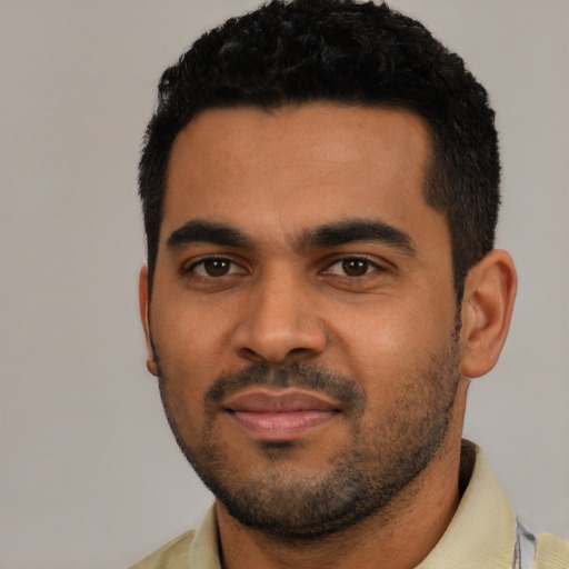 Neutral black young-adult male with short  black hair and brown eyes