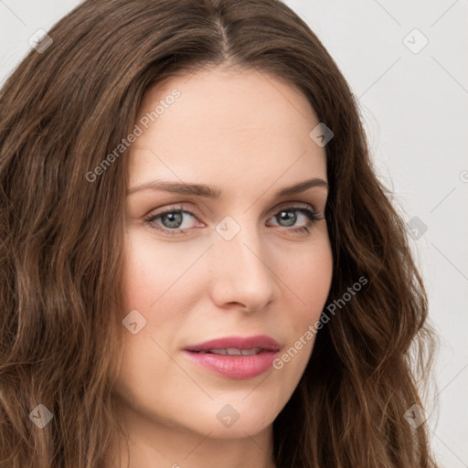 Joyful white young-adult female with long  brown hair and green eyes