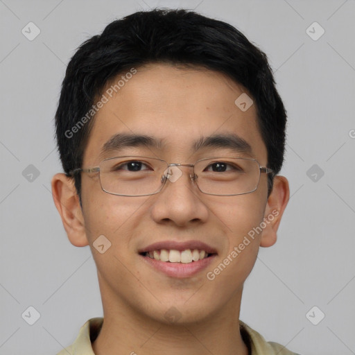 Joyful asian young-adult male with short  brown hair and brown eyes