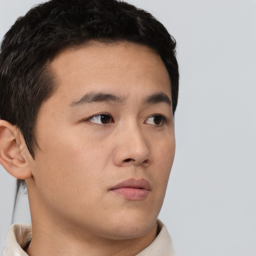 Neutral asian young-adult male with short  brown hair and brown eyes