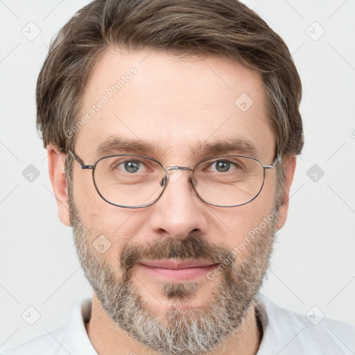 Joyful white adult male with short  brown hair and grey eyes